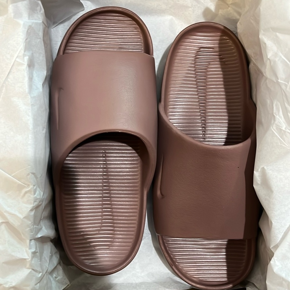 Women’s Nike Calm Slide. Brand new in box. Size 8